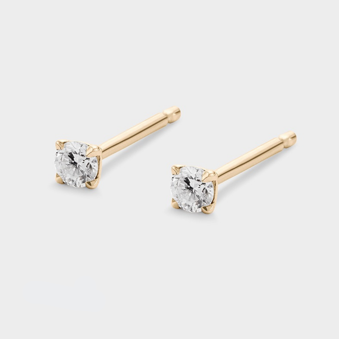 natural diamond studs set in yellow gold 0.05ct