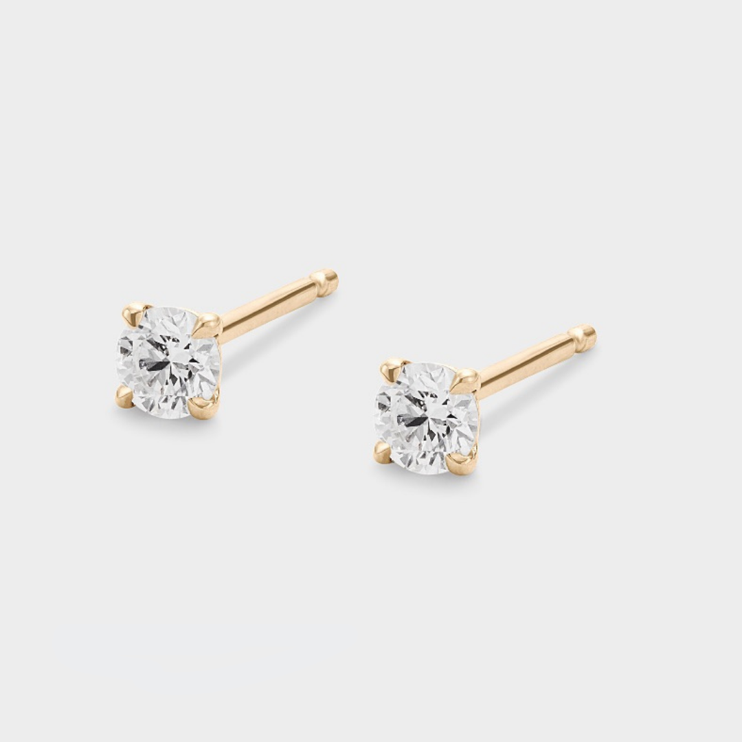 natural diamond studs set in yellow gold 0.10ct