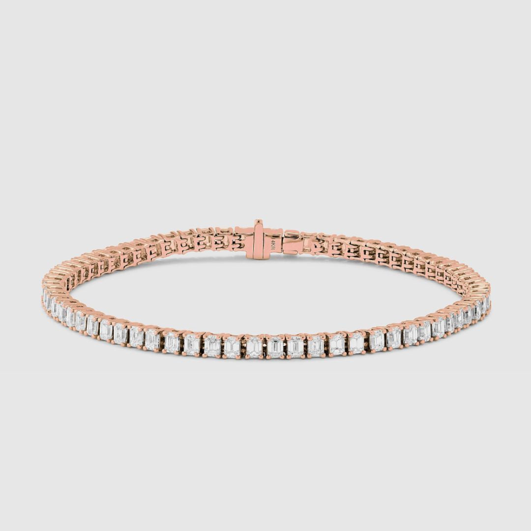 natural diamond tennis bracelet with emerald cut diamonds in rose gold
