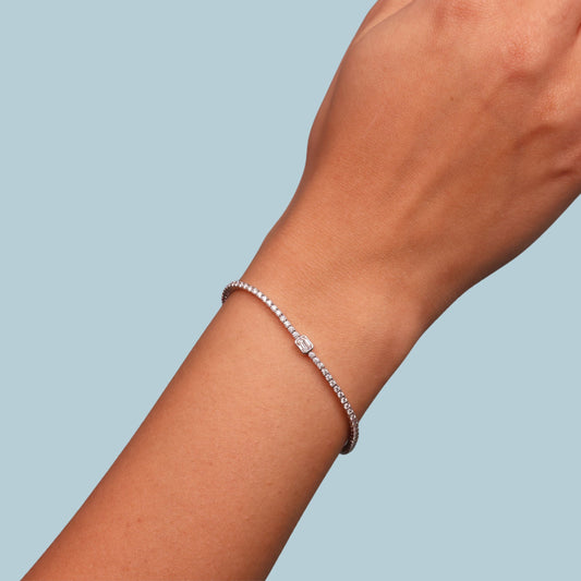 Tennis Bracelet with Bezel Set Emerald Cut Diamond